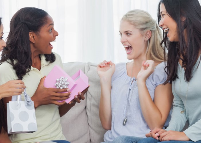 female friends giving gift