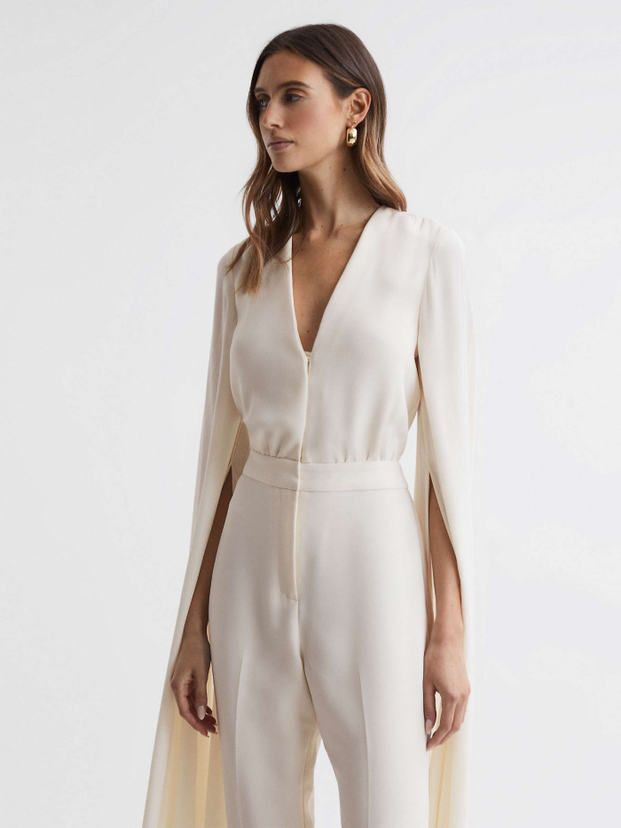 White Jumpsuit with Cape Sleeve Detail